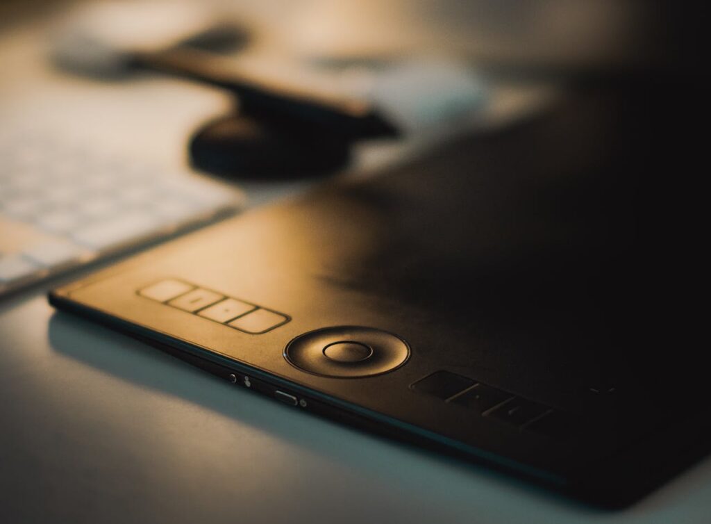 Close-up of a drawing tablet and keyboard. Perfect for digital artists.